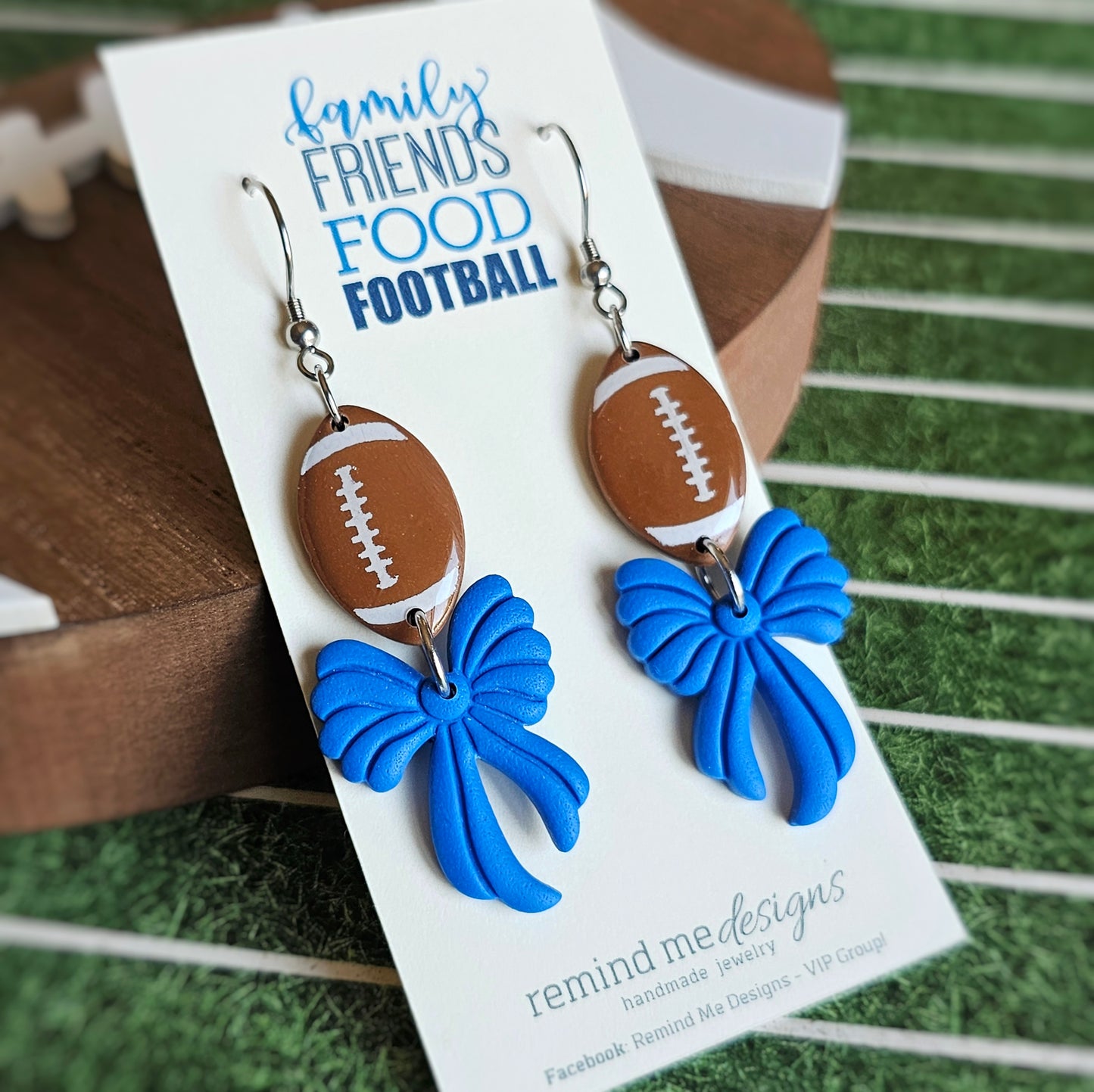 Brown Football with Blue Bow Clay Dangle Earrings
