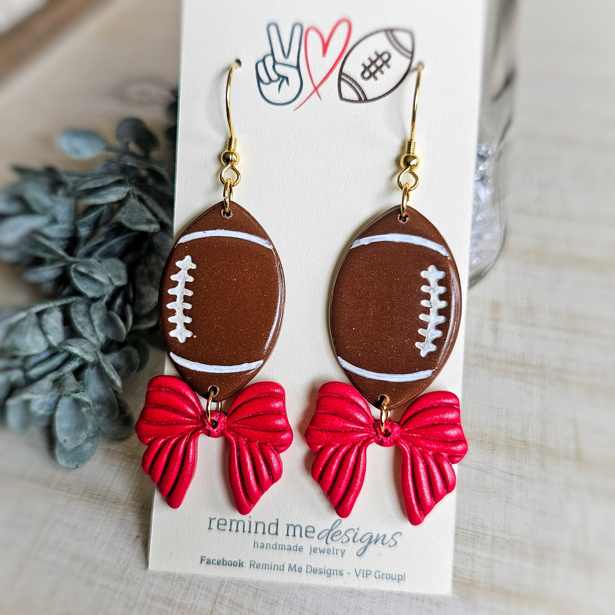 Brown Football with Red Bow Clay Dangle Earrings