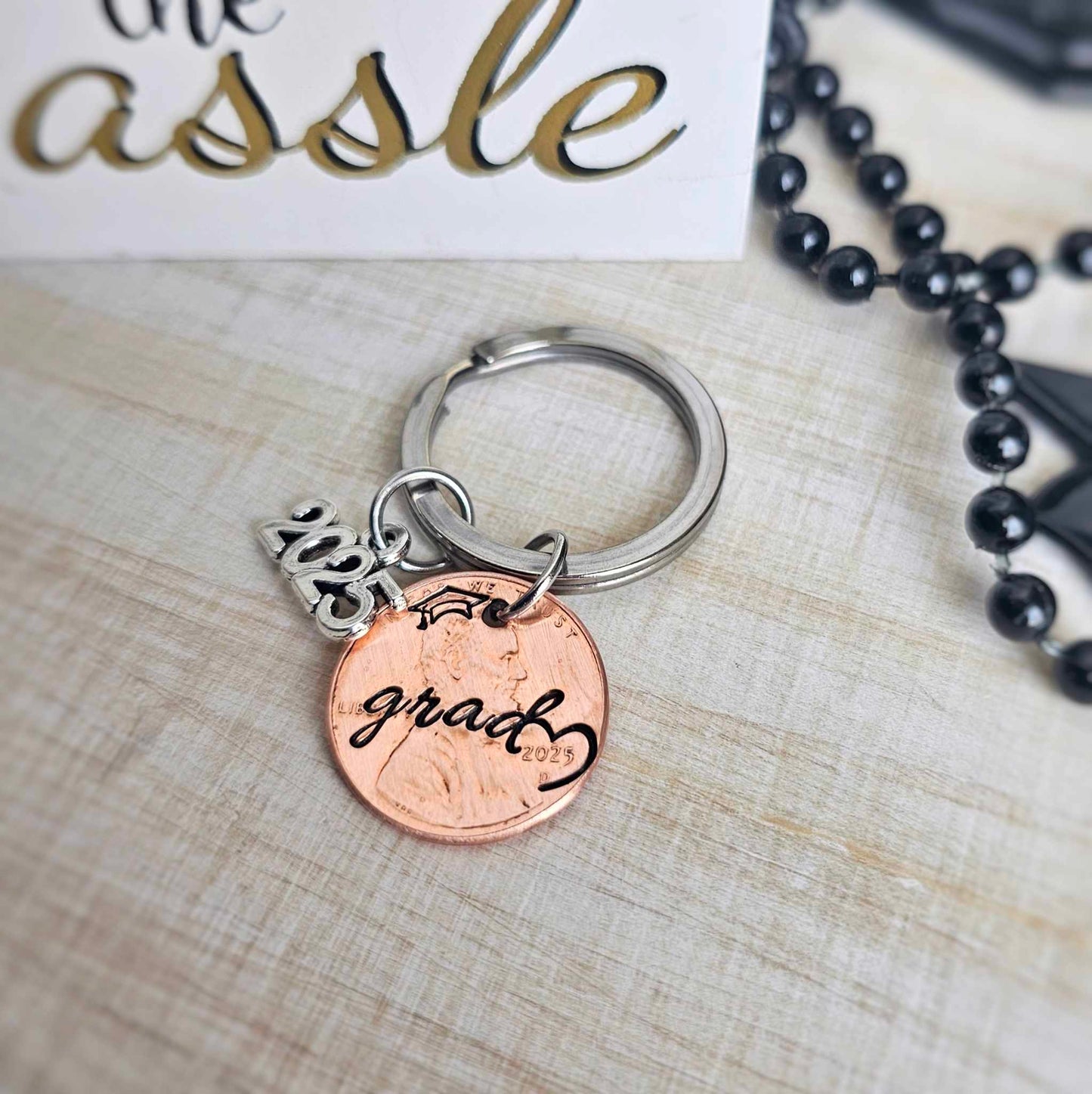 Cursive "grad" 2025 Penny Graduation Keychain with heart