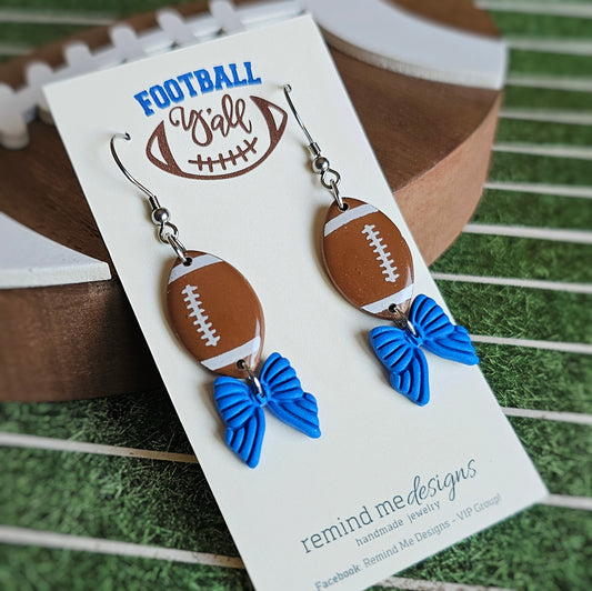 Brown Football with Blue Bow Clay Dangle Earrings