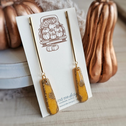 Mustard Yellow Sunflower Print with Gold Clay Dangle Earrings