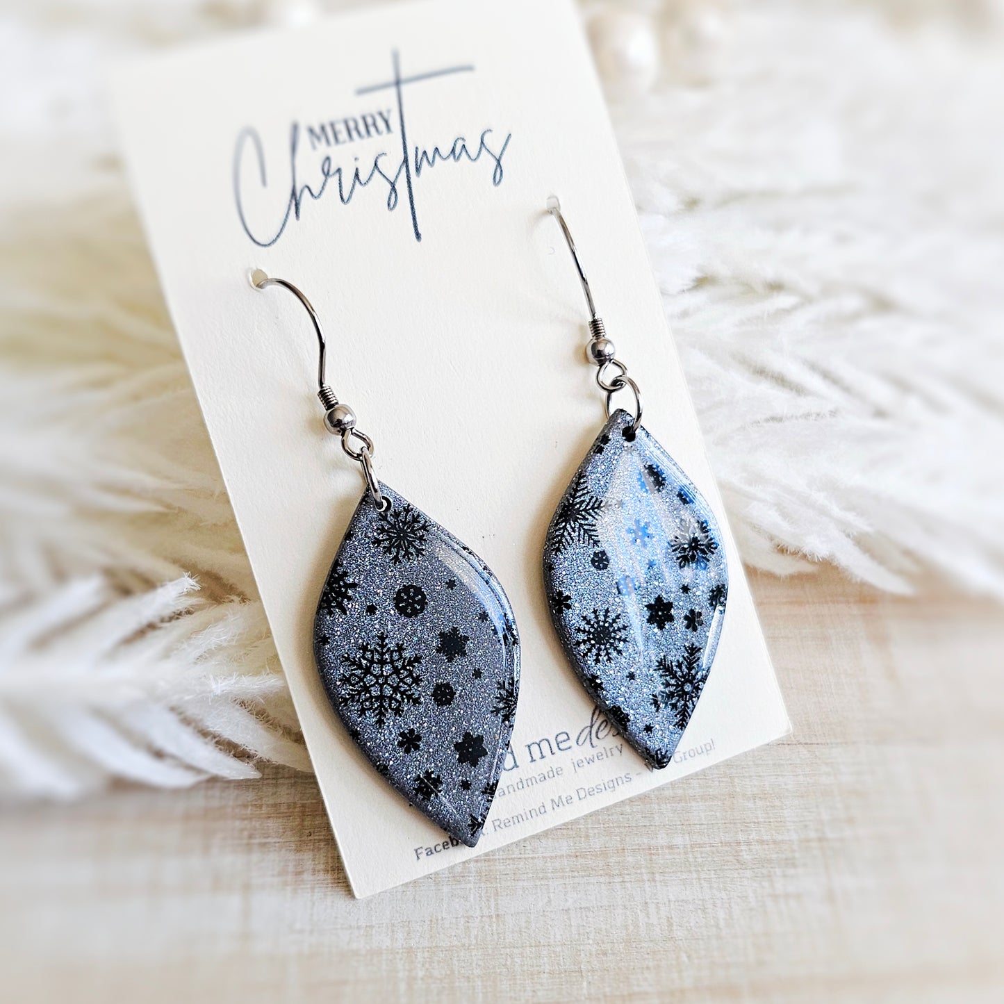 Silver and Black Snowflake Dangle Earrings