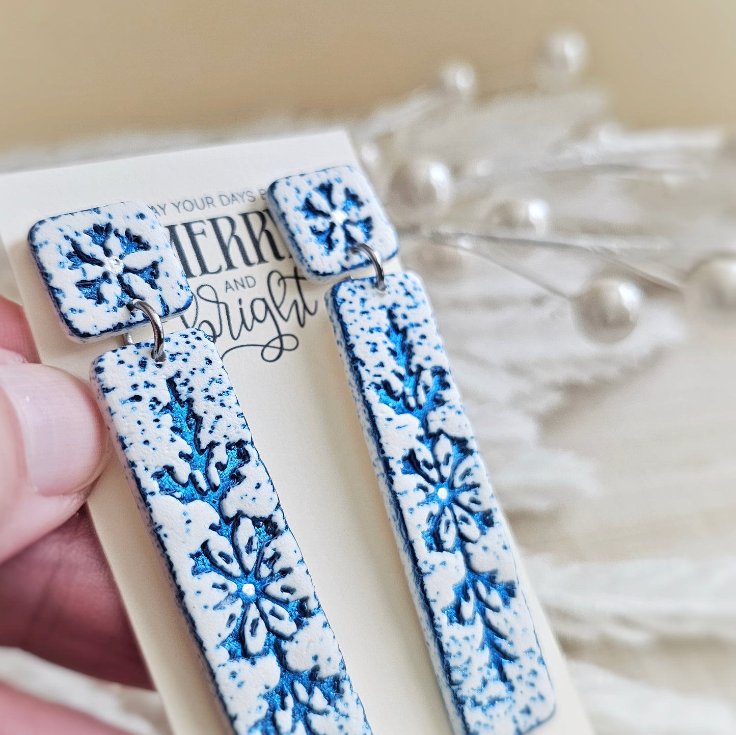 White and Blue Foil Snowflake Dangle Earrings