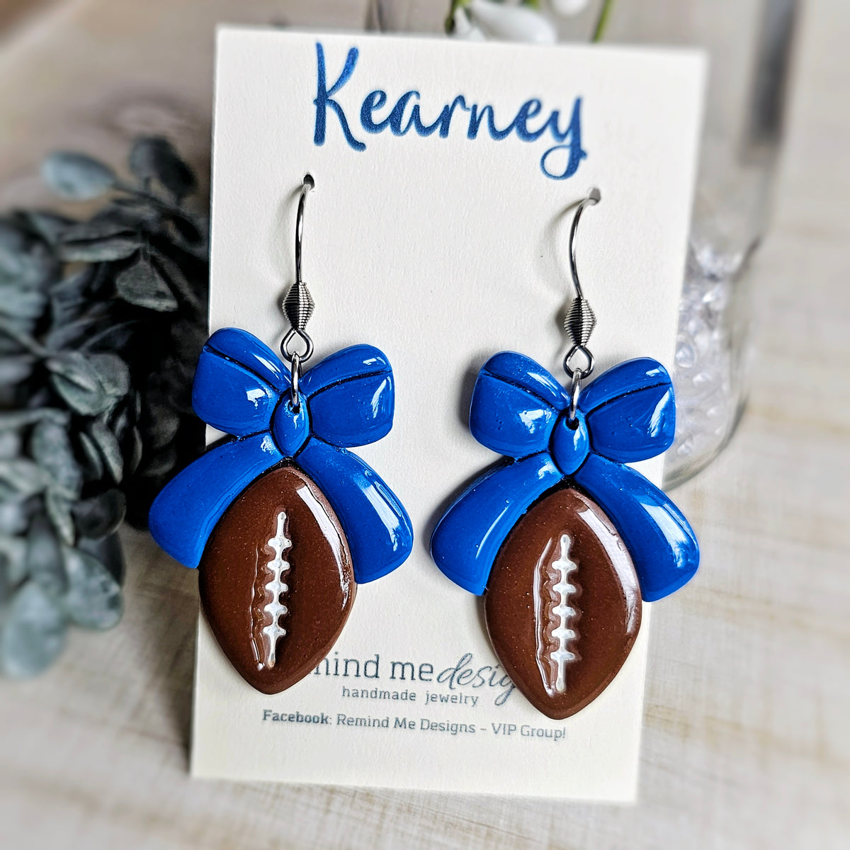 Blue Bow with Brown Football Clay Dangle Earrings