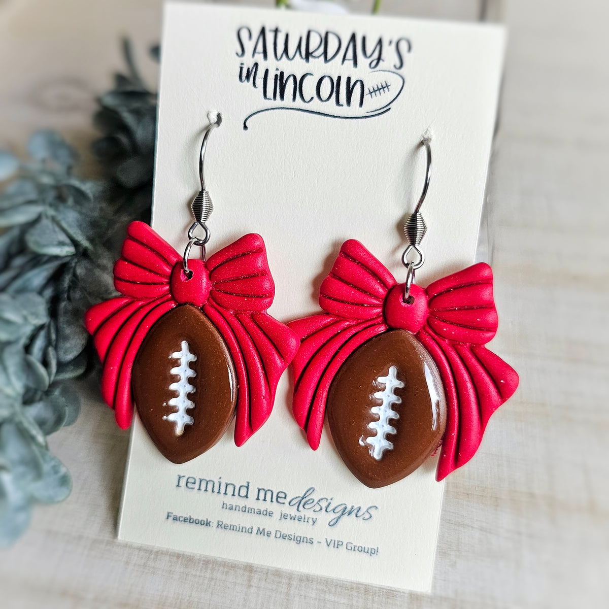 **MADE TO ORDER** Brown Football with Red Bow Clay Dangle Earrings