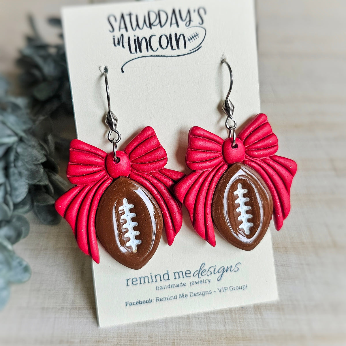 **MADE TO ORDER** Brown Football with Red Bow Clay Dangle Earrings