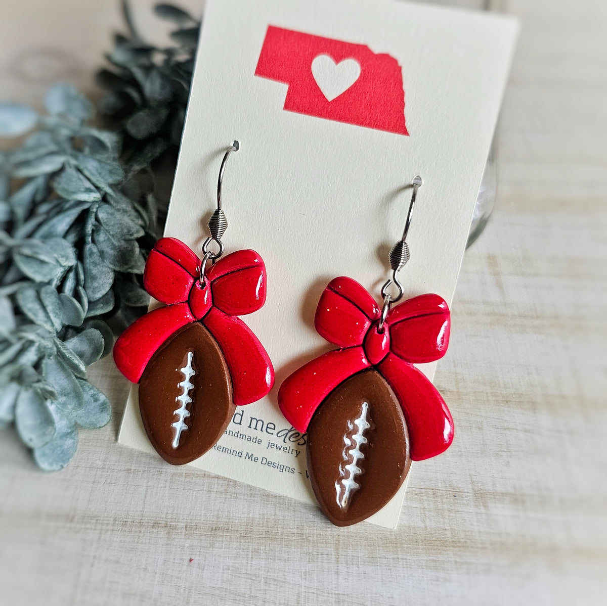 Brown Football with Red Bow Clay Dangle Earrings