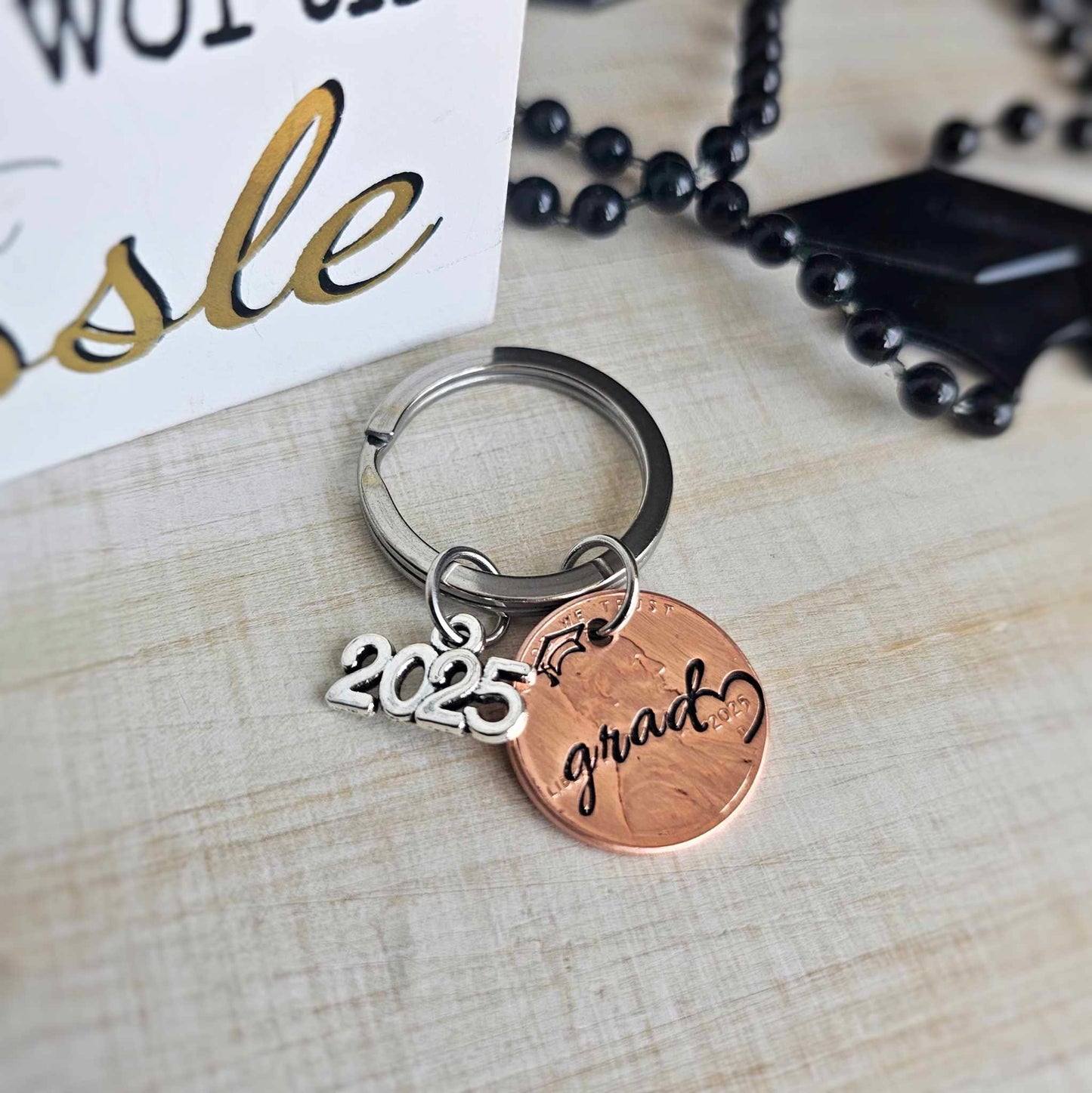 Cursive "grad" 2025 Penny Graduation Keychain with heart