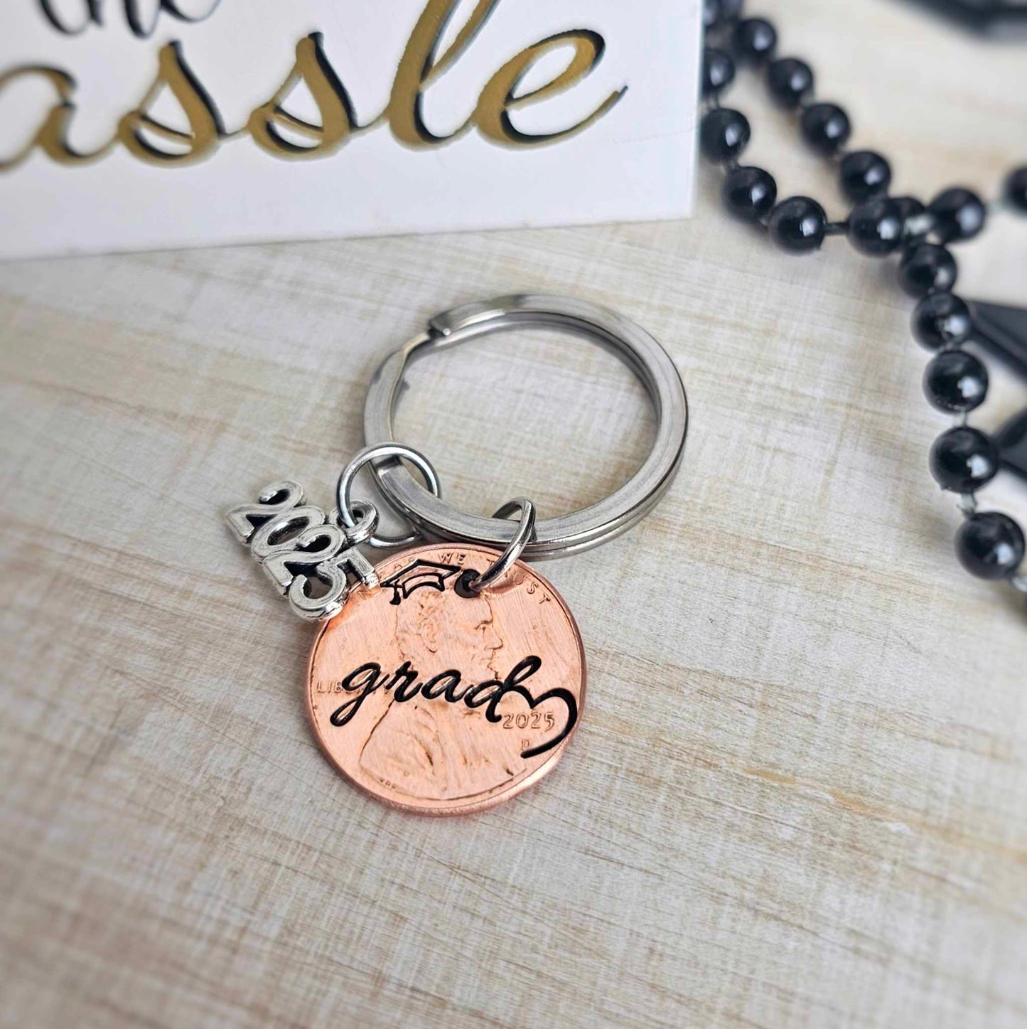 Cursive "grad" 2025 Penny Graduation Keychain with heart