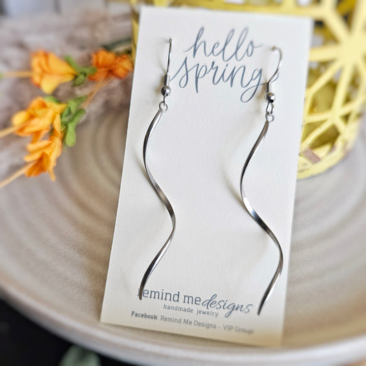 Large Silver Twirl Dangle Earrings